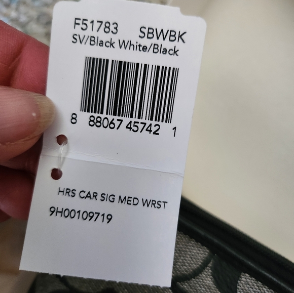 Nwt Coach wristlet, signature color/pattern - Picture 3 of 7